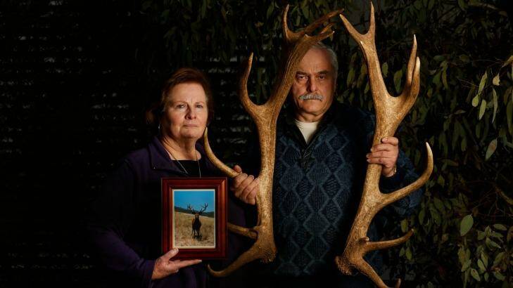 Narelle and Manfred Wagner show off Karl's antlers from last year and hold a newly developed photograph of the deer. Photo: Mark Jesser