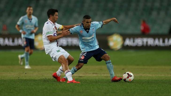 Shades of green: The relaid Allianz Stadium pitch was not to Sydney FC's liking against Perth Glory. Photo: Anthony Johnson