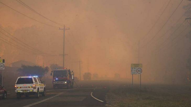 Fires are threatening properties in the Hunter region. Photo: Michael John Fisher