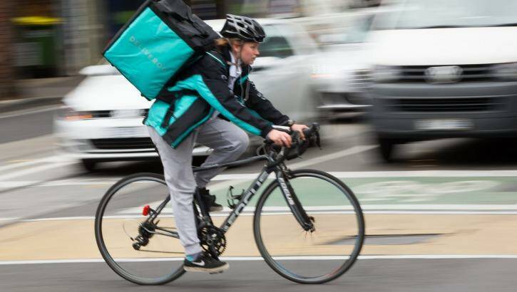 Foodora and Deliveroo employ backpackers and students to deliver food on bicycles. Photo: Jason South