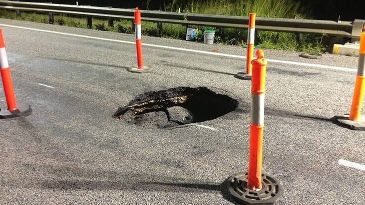 Traffic on the Bruce Highway near Bowen has been blocked by a sink hole. Photo: Chris Campey, Ten Eyewitness News