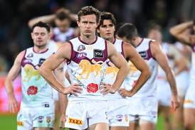 Ryan Lester and the Lions were left with headaches after Brisbane's mauling at Manuka Oval. (Lukas Coch/AAP PHOTOS)