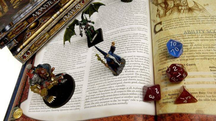 Books, die, and figurines from Dungeons and Dragons  Photo: Simon Hayter