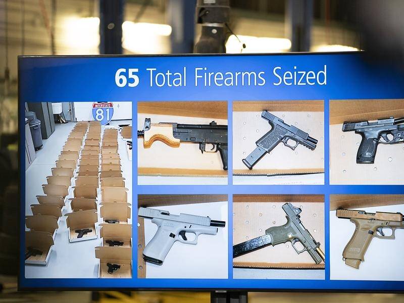 Canadian police allege suspects sold stolen gold to buy several firearms. (AP PHOTO)