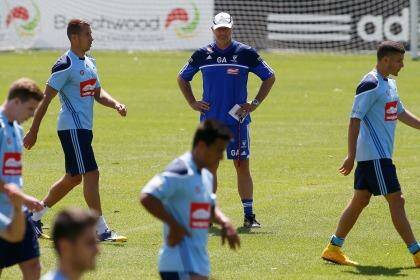 Mind games: Sydney FC coach Graham Arnold oversees a training session on Thursday. Photo: Daniel Munoz