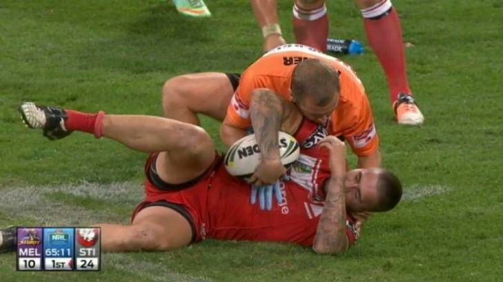 Down for the count: Joel Thompson's injury started a remarkable sequence of events that left the Dragons with just 12 players for the final moments of their loss to Melbourne. Photo: Fox Sports