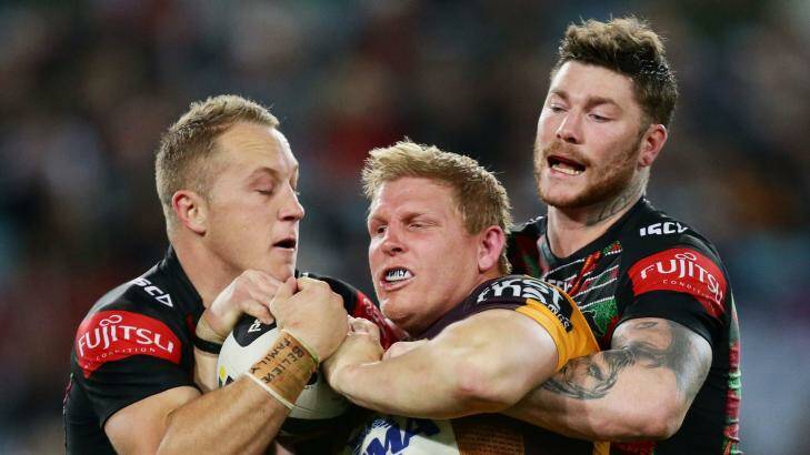 Brisbane's Ben Hannant is tackled in the game against South Sydney last Thursday.   Photo: Photo: Getty Images/Matt King