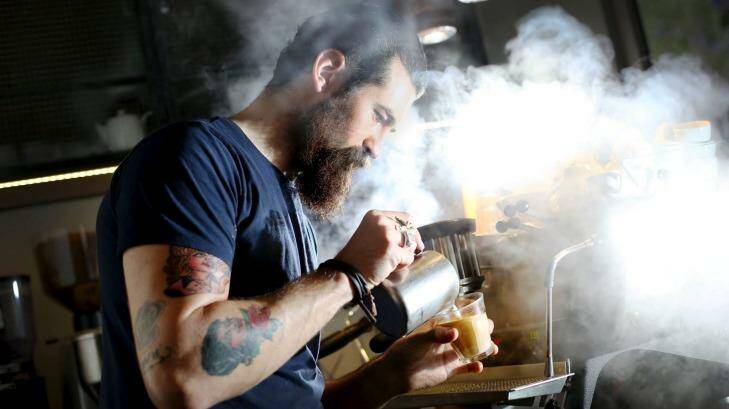 Barista Sean McManus makes coffee at Single Origin, Surry Hills. Photo: Brianne Makin