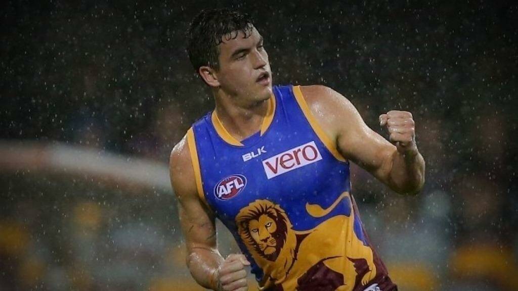 Serious injury...Brisbane Lions captain Tom Rockliff suffered suspected broken ribs in Saturday's opening round loss to Collingwood.