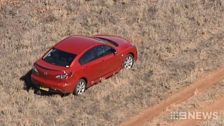 Stephanie Scott's car on the side of the road in a wheat field about eight kilometres from Leeton. Photo: Channel Nine