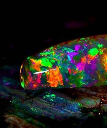 Wondrous and unique: The Virgin Rainbow opal.  Photo: South Australia Museum