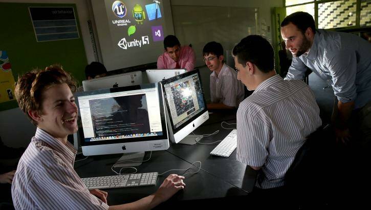 App developers Alex Benevento and William Egan  teach students how to develop code at their  old school Penleigh and Essendon Grammar where they have  started a code club. Photo: Patrick Scala/Fairfax Media