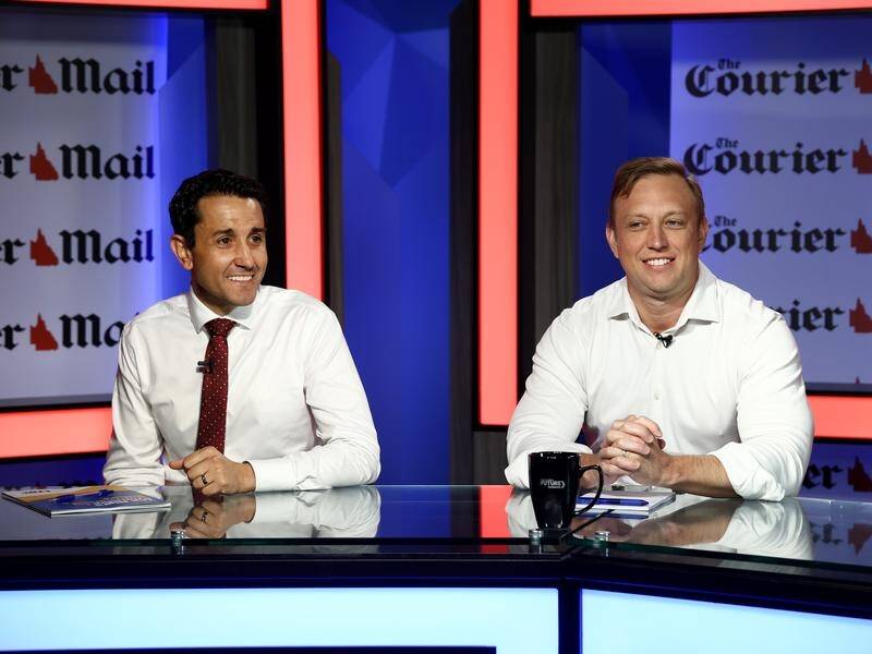 Queensland's LNP led by David Crisafulli (left) has increased its lead over Steven Miles' Labor. (David Clark/AAP PHOTOS)
