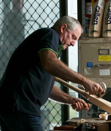 Ian Callen in his bat-making workshop in Tarrawarra. Photo: Eddie Jim