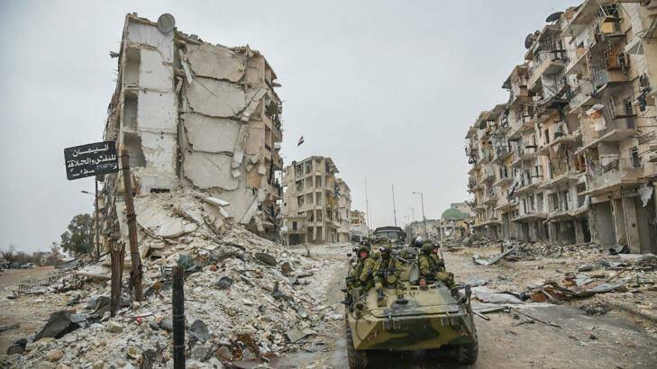 Russian troops in the devastated Syrian city of Aleppo.  Photo: Russian Defence Ministry/AP