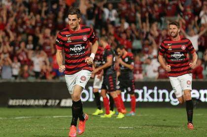  Tomi Juric  celebrates scoring a goal during the round against Adelaide United. Photo: Mark Metcalfe