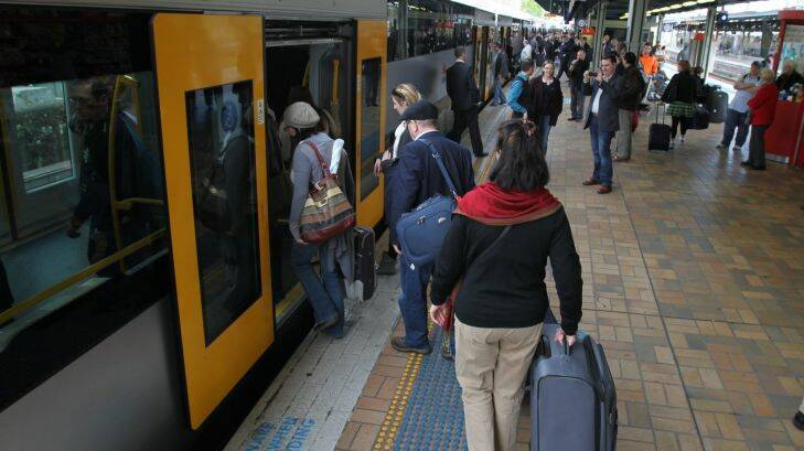 New train, Waratah gets its first run for Cityrail on the Bankstown line. Passengers board at Central station. SMH News. 01 July 2011. Photo by Simon Alekna.