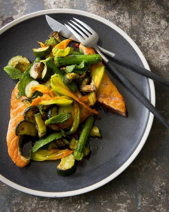 Karen Martini's salmon with fried zucchini flowers, chilli and mint can be ready in 15 minutes <a href="http://www.goodfood.com.au/good-food/cook/recipe/panfried-salmon-with-fried-zucchini-zucchini-flowers-chilli-and-mint-20140114-30roa.html"><b>(Recipe here).</b></a> Photo: Marcel Aucar