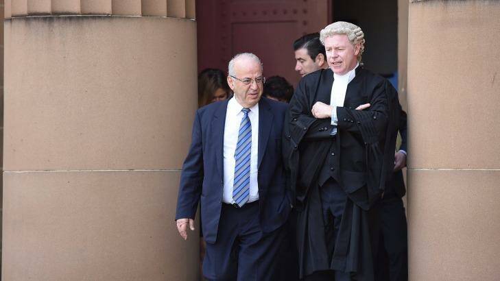 Former Labor minister Eddie Obeid (left) leaves at The Supreme Court during a break on the first day of his trial. Photo: Kate Geraghty
