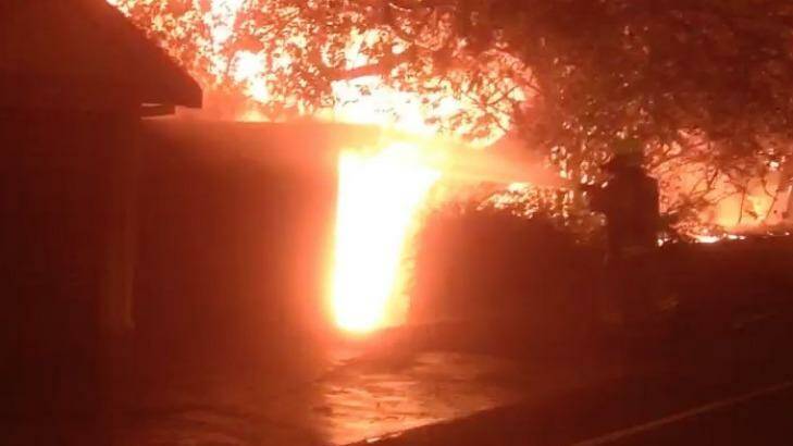 A fire destroyed a waterfront house at Palm Beach. Photo: Top Notch Video