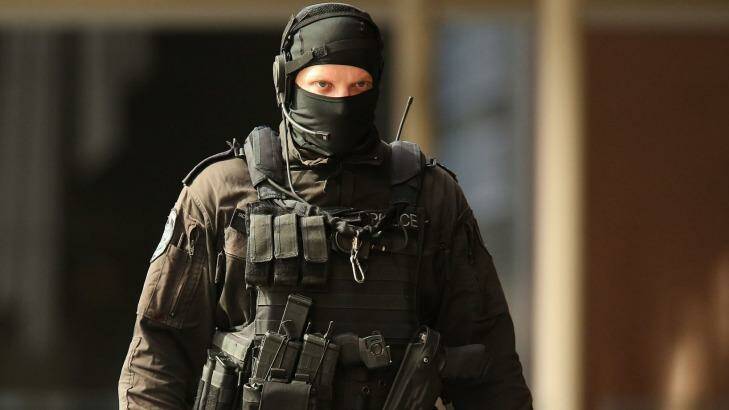 The leader of of one of the police assault teams said he found himself a metre away from a hostage, with the gunman directly behind her. Photo: Brendon Thorne
