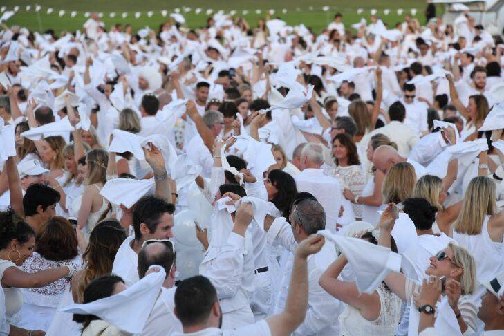 Social Seen: Gritty Pretty's Eleanor Pendleton and her boyfriend Mathew Wilson at Diner en Blanc in Sydney's Centennial Park on Saturday, November 25, 2017, where over 5000 picnic-goers dressed in white descended on the park for the annual picnic.