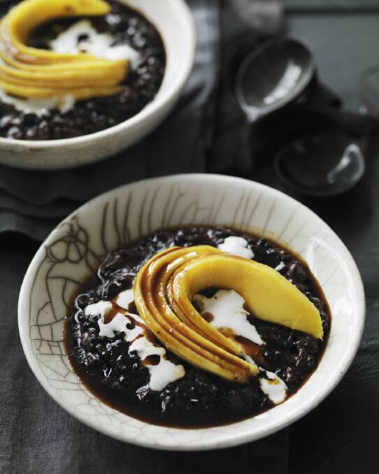 Neil Perry's black sticky rice with mango and coconut cream <a href="http://www.goodfood.com.au/good-food/cook/recipe/black-sticky-rice-with-mango-and-coconut-cream-20120116-29u54.html"><b>(RECIPE HERE).</b></a> Photo: William Meppem