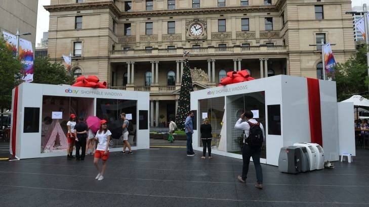 Online retailer eBay has opened real world stores to capitalise on Christmas, like this one in front of Customs House in Sydney. Photo: Nick Moir