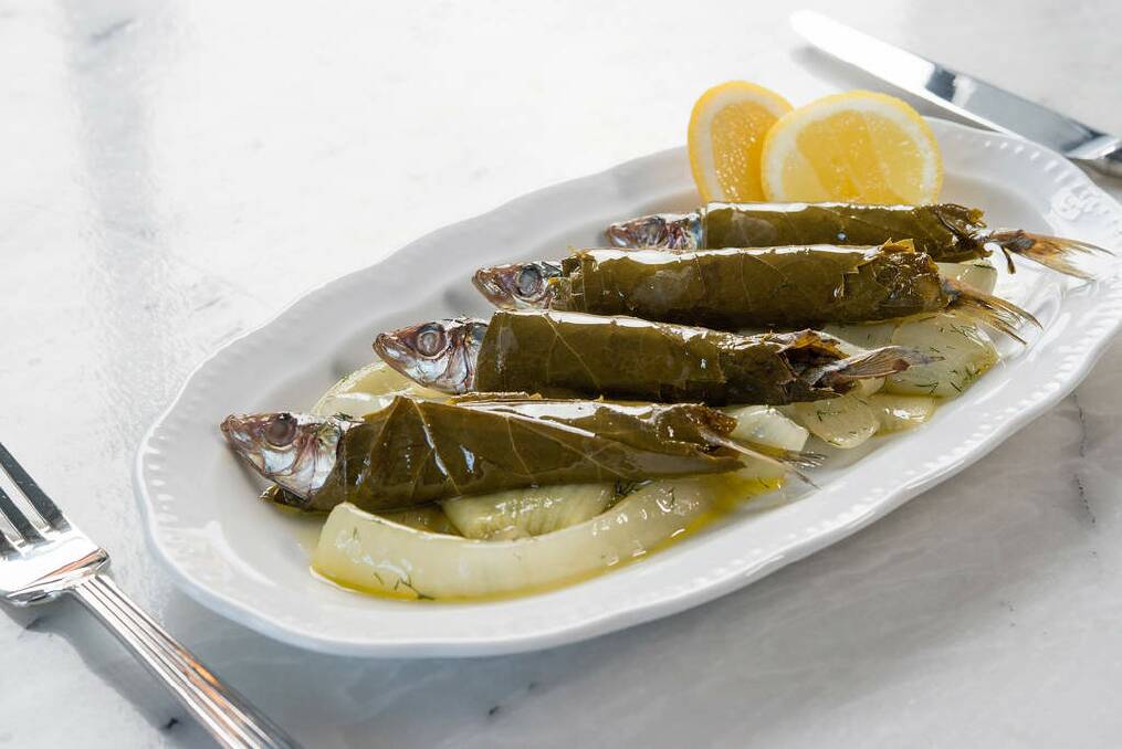 Bar snack: grilled sardines in vine leaves at Elyros. Photo: Jesse Marlow