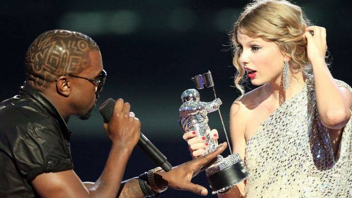 Kanye West takes the microphone from Taylor Swift as she accepted a VMA in 2009. Photo: MTV
