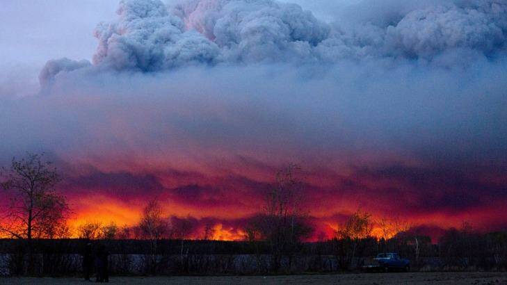 The wildfire this week forced the evacuation of 88,000 people from Fort McMurray, located in the heartland of Alberta's energy region. Photo: Jason Franson/The Canadian Press