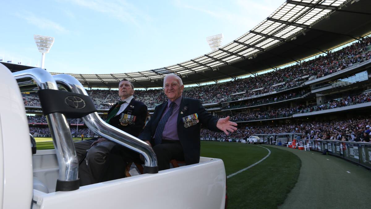 Doing a lap of honour at the MCG before the game. Photo: Wayne Taylor, The Age. 