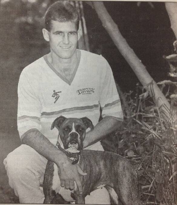 Mt Austin cricketer Brett Page, with pet dog Sophie, before the two-day grand final against South Wagga.