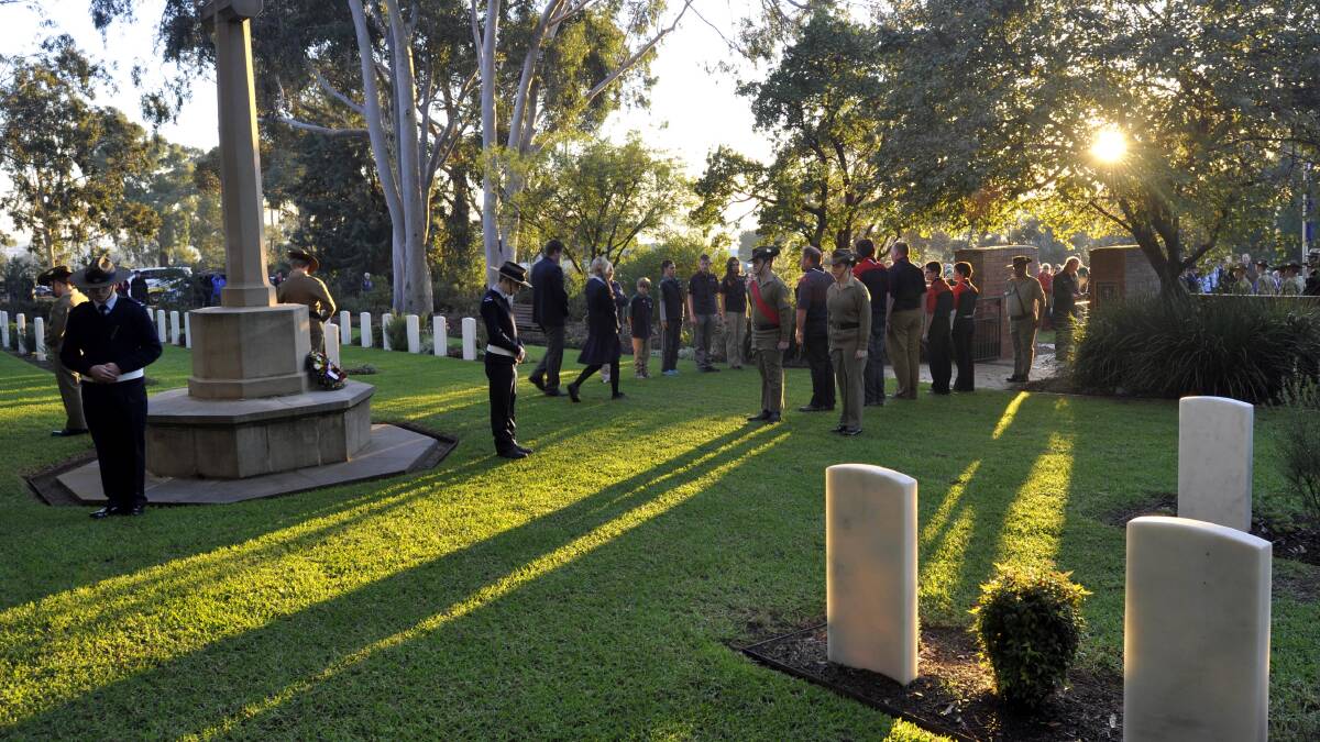 Dawn service at the war cemetery. Picture: Les Smith