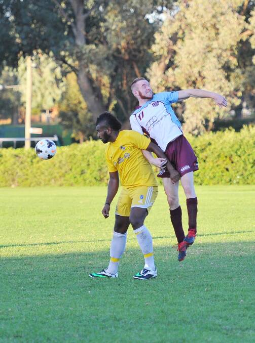 Griffith soccer. Eastern Wanderers v Yoogali. Sam Kautoga and Jamie Rankin. Picture: Kieren L Tilly