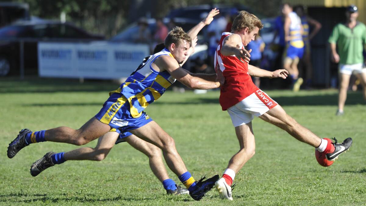 RFL. MCUE v CAK. Lachlan Moore kicks and Jock Cornell chases. Picture: Les Smith 