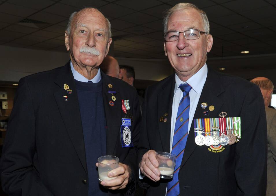 Bob Toose and Dave Gardiner have a rum and milk at the RSL Club. Picture: Les Smith