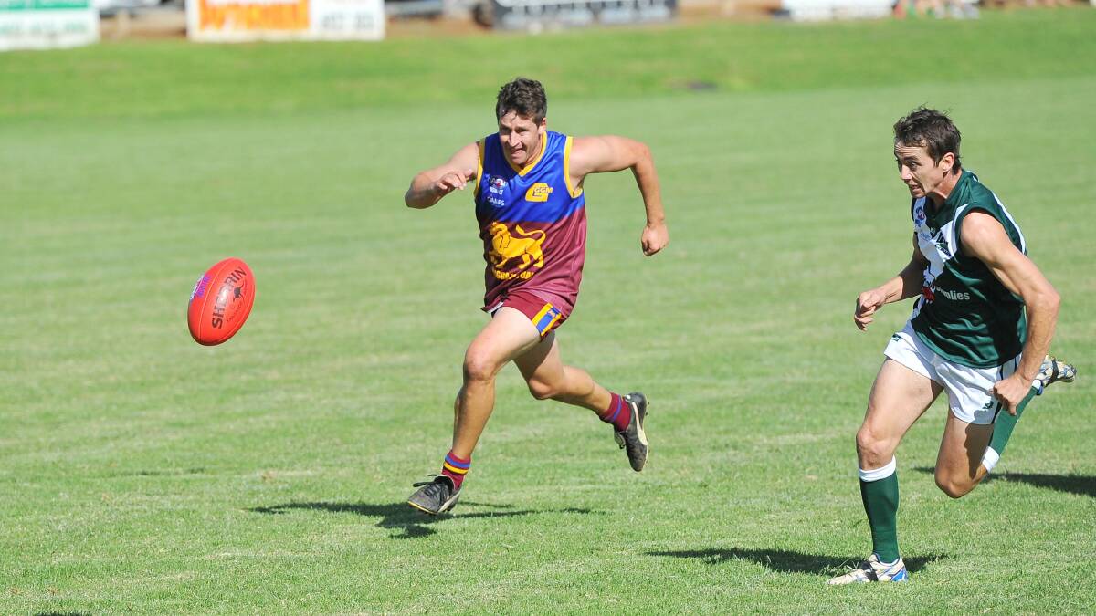 RFL. Coolamon v GGGM. GGGM's Ash Dickenberg is chased by Coolamon's Adam Mckenzie. Picture: Kieren L Tilly 