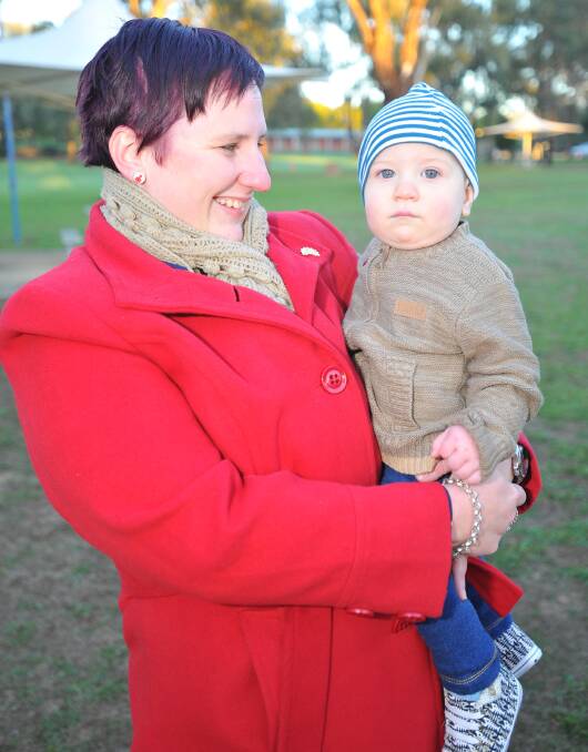 Dawn service at Kapooka. Jane Howat and Marcus Howat, 10 months, of Kapooka. Picture: Kieren L Tilly