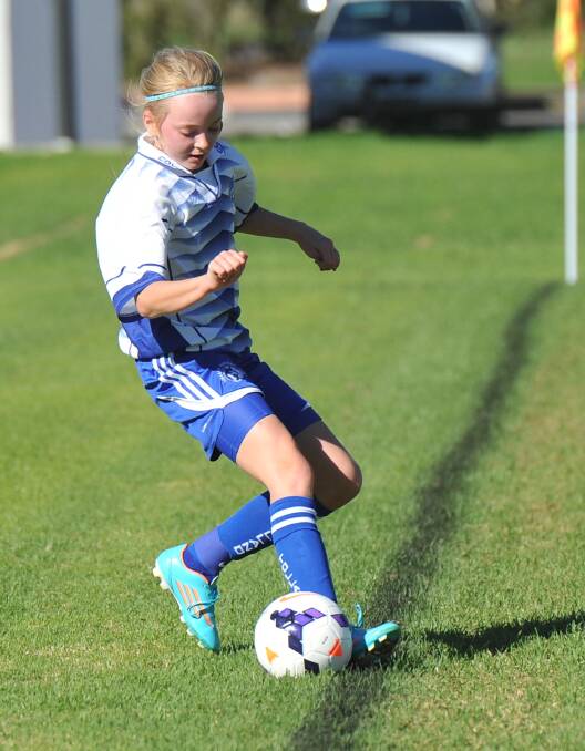 Junior soccer. Hope Gray, 11, from Tolland Cubs. Picture: Laura Hardwick 