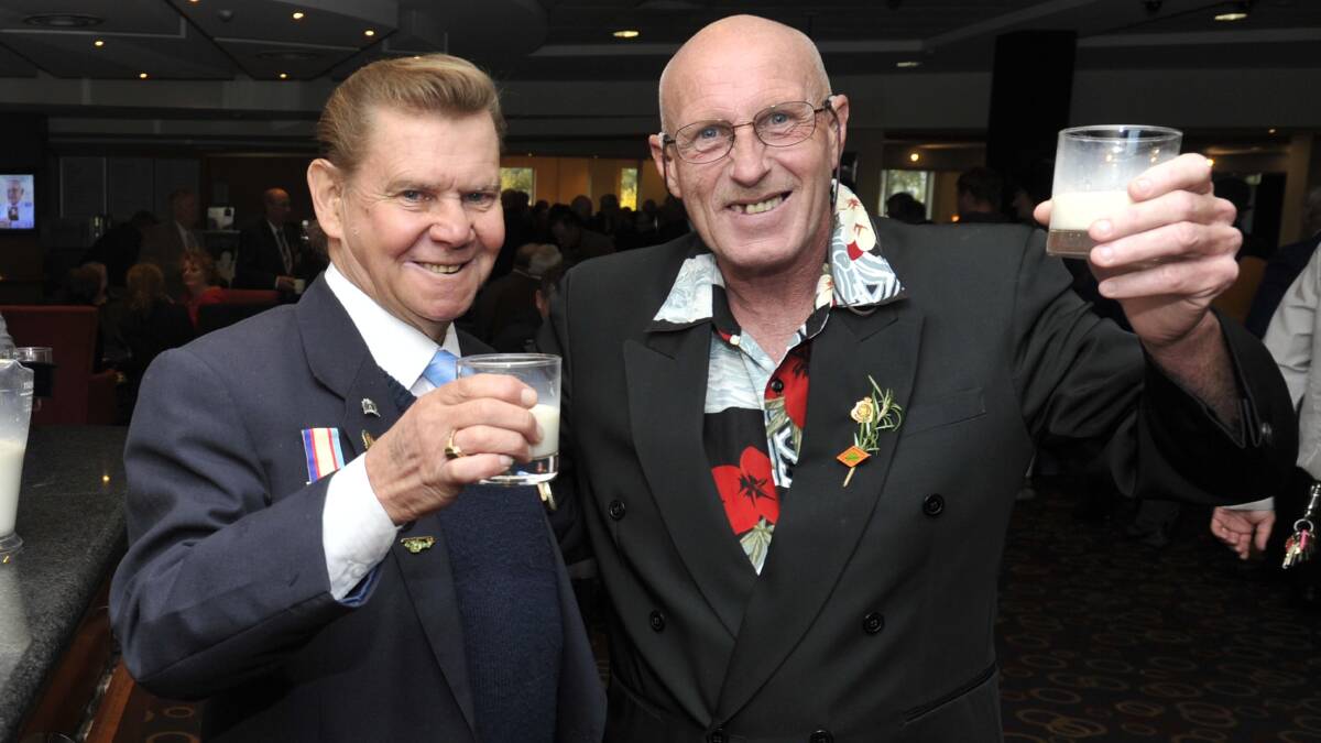 Ex-servicemen Pat Stapylton and Chris Huber enjoy a rum and milk at the RSL Club. Picture: Les Smith