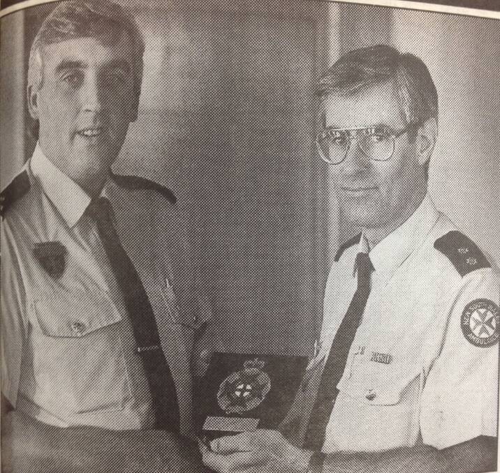 Wagga Ambulance Station farewelled David O'Toole (left) after 11 years of service. Officer in charge of the Wagga station, Gordon Bates, is pictured with Mr O'Toole.