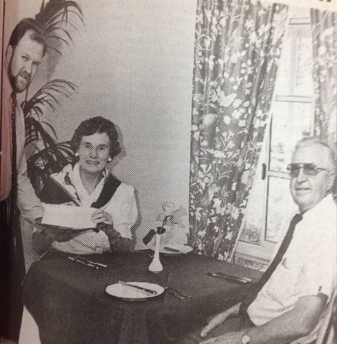 Deirdre Knight is pictured enjoying a meal at the Old Wagga Inn with her husband Mac. She was the first winner of the Tangle Word competition and they are joined by the inn's manager, Danny Maher.