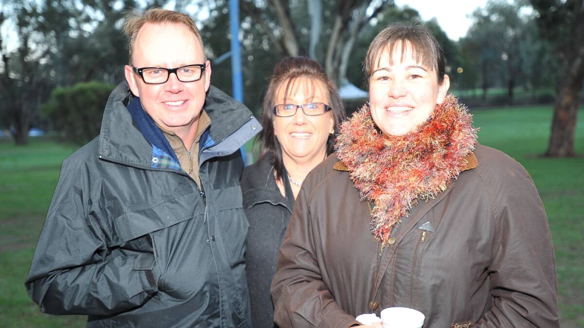 Dawn service at Kapooka. Neil Wright, Jo Paton and Erin Devlin, all of Wagga. Picture: Kieren L Tilly