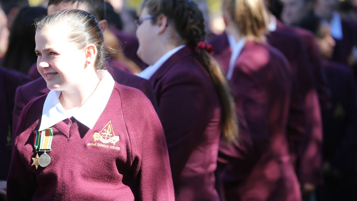 Anzac Day in Griffith. Meg Dal Broi wearing her grandfather's Pacific Star medal. Picture: Anthony Stipo 