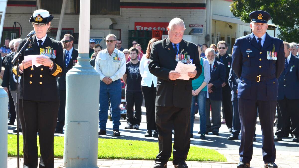 Anzac Day in Junee. Guest speaker Captain Rachael Durbin of the Royal Australian Navy with Junee RSL sub-branch vice president Les Haywood and Squadron Leader Peter Hogarth. Picture: Declan Rurenga 