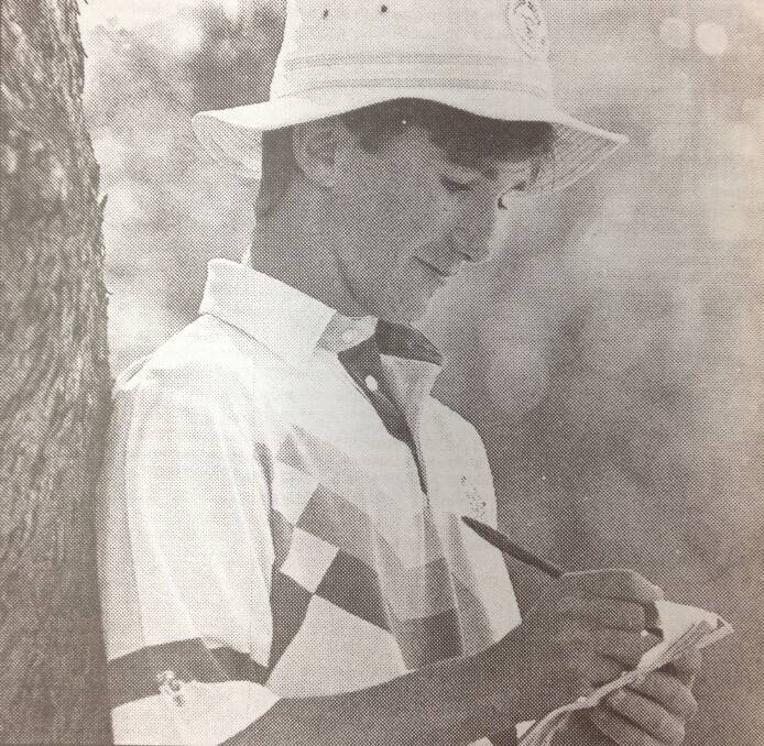 Paul Dwyer, 15, marks his scorecard during the Jack Newton Junior Golf Foundation Riverina region qualifying round at Wagga Country Club.
