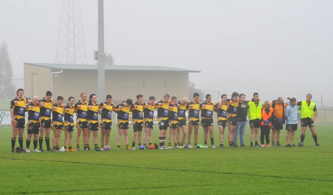 SILENCE: The boys also stood for one minute's silence in Lui's memory. (Photo: Keiran L Tilly) 
