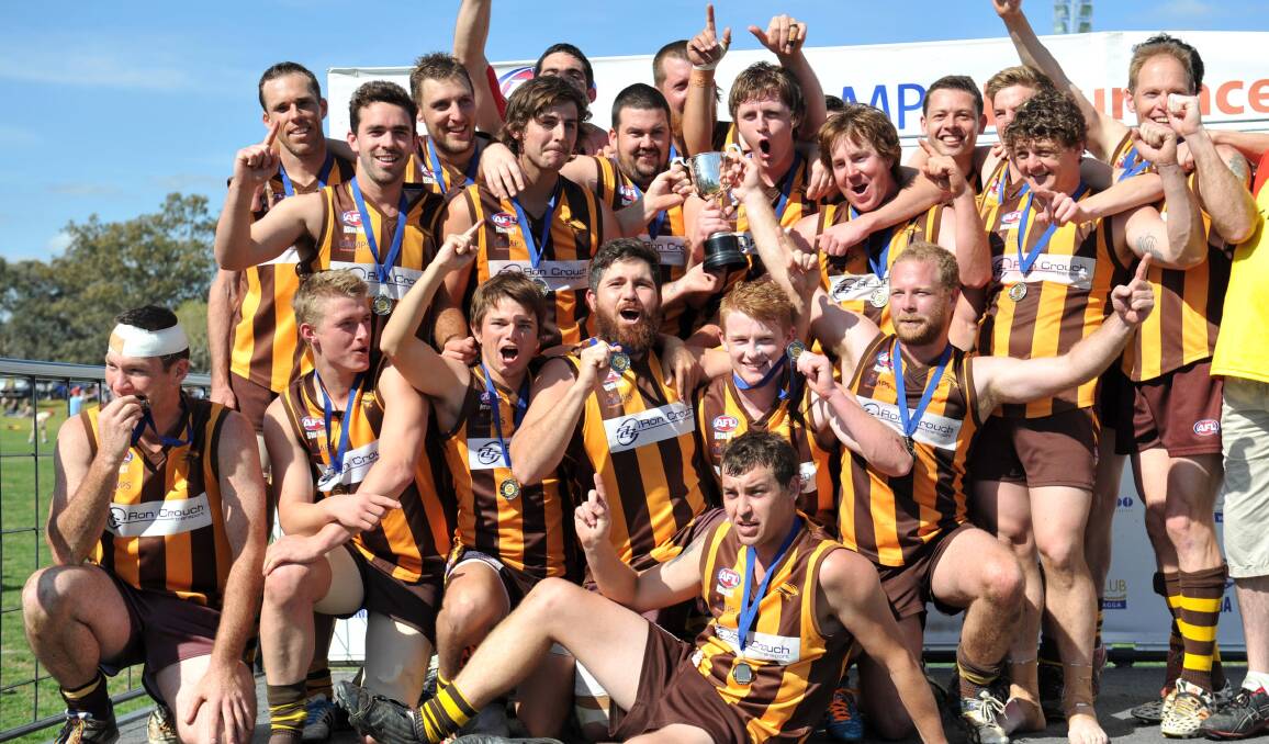 PARTY TIME: East Wagga-Kooringal's reserve grade team celebrate its grand final victory at Maher Oval on Saturday. Picture: Michael Frogley