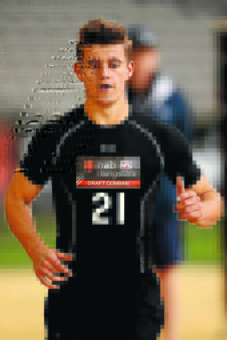 THUMBS UP: Wagga teenager Mick Mattingly runs in the beep test during day four of the 2014 NAB AFL Draft Combine at Etihad Stadium, Melbourne, in October. Picture: AFL Media